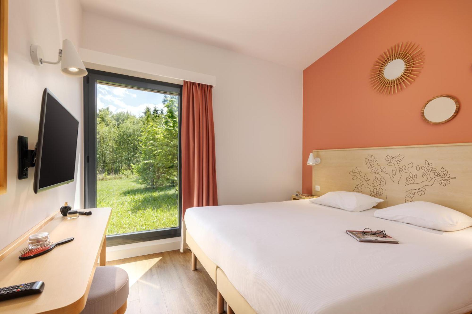 Center Parcs Les Trois Forets Аттиньи Экстерьер фото